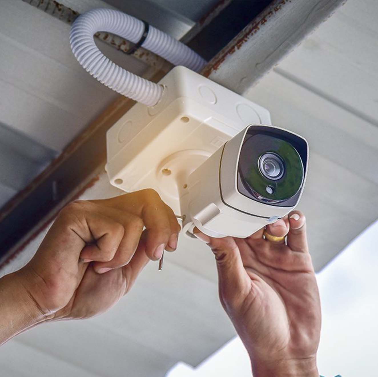 Technician-installing-CCTV-Camera